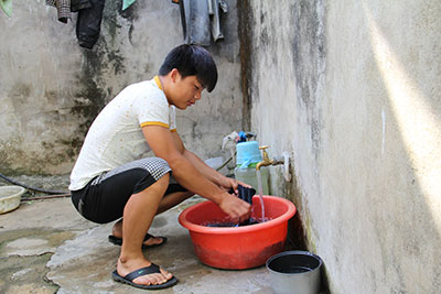 Các hộ dân ở bản Dửn, xã Chiềng Ngần, Thành phố được sử dụng nước sinh hoạt hợp vệ sinh.